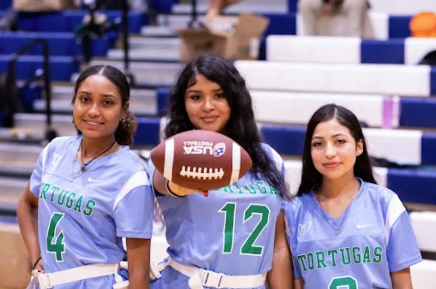 girls-flag-football-players-with-football