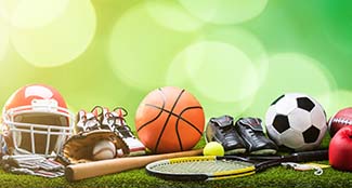 LC-sports-various-sport-equipment-on-green-background-banner.jpg